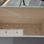 Wäschetruhe mit Lederverkleidung