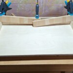 Wäschetruhe mit Lederverkleidung