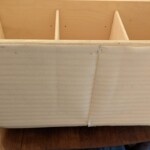 Wäschetruhe mit Lederverkleidung