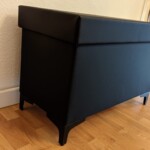 Wäschetruhe mit Lederverkleidung